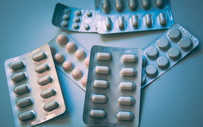 Pharmaceutical medical representative logging a doctor visit in the field